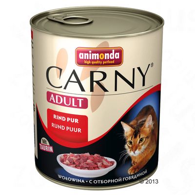 Blik Animonda Carny Adult kattenvoer, rund puur, met taurine. Afbeelding van een kat en een schaal vlees op het etiket. Tekst in meerdere talen zichtbaar.
