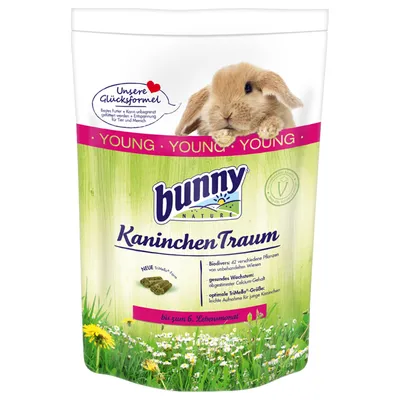 Confezione Bunny Nature KaninchenTraum Young, immagine di coniglio, testo tedesco: Unsere Glücksformel, Biodivers: 42 verschiedene Pflanzen, bis zum 6. Lebensmonat, simbolo vegetariano.