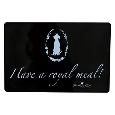 Black mat with white text 'Have a royal meal!' and logo 'The little King of Dogs' with silhouette of a dog in a decorated frame.