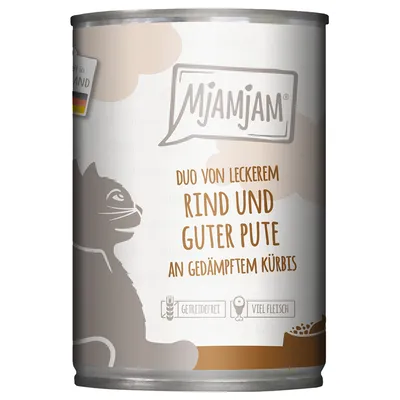 Mjamjam Duo von leckerem Rind und guter Pute an gedämpftem Kürbis, texte en allemand sur la boîte, illustration de chat, mentions Getreidefrei et Viel Fleisch visibles.