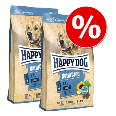 Dwie torby karmy Happy Dog NaturCroq XXL Adult z widocznym napisem „Made with Love in Germany” i dużym czerwonym symbolem procentowym, sugerującym promocję.