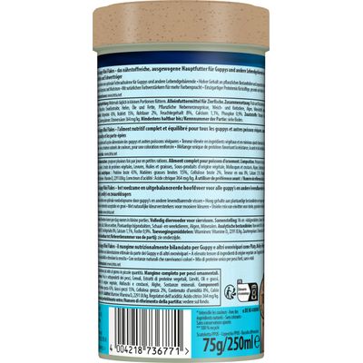 Tetra Guppy Mini Flakes, volledig voer voor siervissen. Samenstelling en analytische bestanddelen: eiwit 43%, vet 15%, ruwe vezel 2%, vocht 8%, calcium 1,1%, fosfor 0,9%.