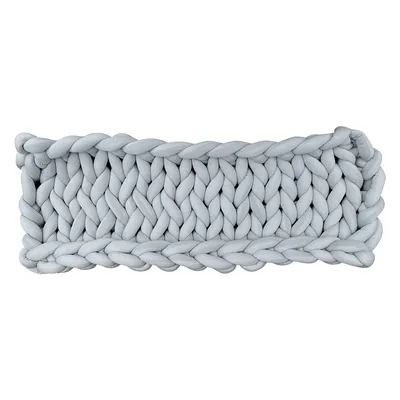 Panier rectangulaire tressé en tissu gris, mailles épaisses visibles, sans marque apparente ni texte.