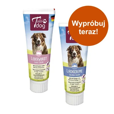 Dwie tubki Tubi Dog: Leberwurst Liver Cream i Lachscreme Salmon Cream z wizerunkiem psa. Widoczny napis na pomarańczowym kole: Wypróbuj teraz! Tekst na opakowaniach w języku niemieckim i angielskim.