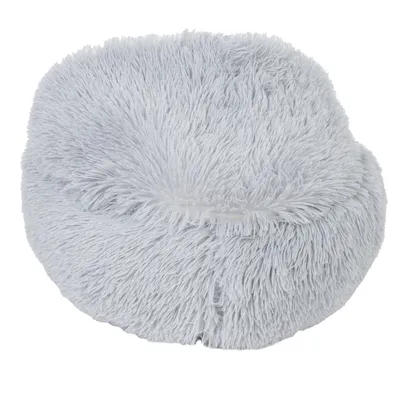 Coussin rond gris clair en tissu à poils longs, sans marque visible, présenté seul sur fond blanc.