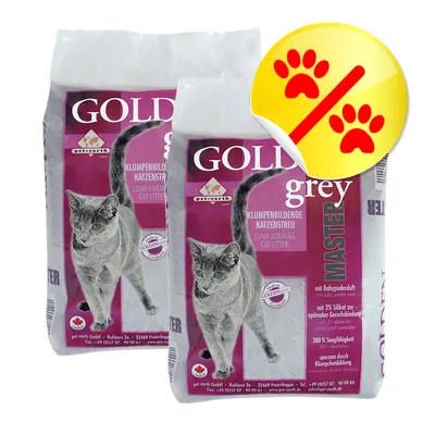Två påsar Golden Grey Master klumpbildande kattsand, synlig text: 'Lump forming cat litter', 'mit Babypuderduft', röd rabattikon med tassavtryck uppe till höger.