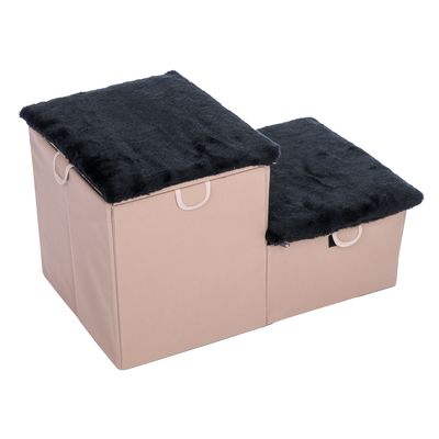 Escalier pour animaux à deux marches, structure beige avec revêtement supérieur noir en tissu peluche, poignées visibles sur chaque marche.