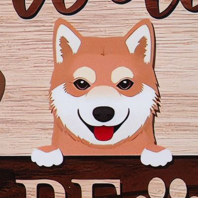 Illustration of a dog with brown fur and a white snout looking over a wooden sign. Below are paw prints and partially visible text.