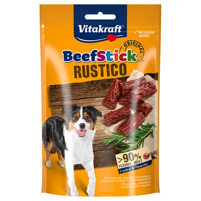 Vitakraft BeefStick Rustico, sachet orange avec morceaux de viande, image de chien, mention '>90 % Fleisch/Meat + extra Vitamins', 'No sugar added' visible en haut à droite.