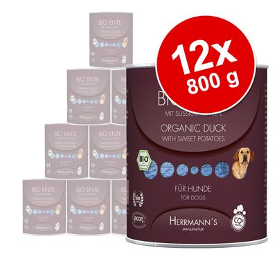 Pack de 12 latas de 800 g de Herrmann's Bio Ente Organic Duck with Sweet Potatoes para perros. Texto visible: 'BIO', 'CO2 neutral', 'Lacon', 'Für Hunde', 'For Dogs'.