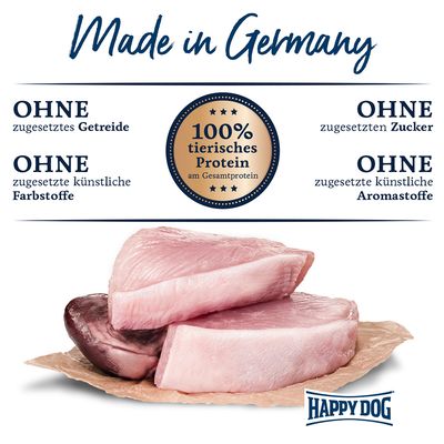 Made in Germany. Ohne zugesetztes Getreide, Zucker, künstliche Farbstoffe und Aromastoffe. 100% tierisches Protein am Gesamtprotein. Happy Dog Logo sichtbar.