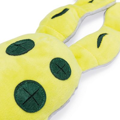 Jouet en peluche jaune pour animaux, forme de lapin avec oreilles longues, décoré de ronds verts cousus et croix noires visibles sur le tissu.