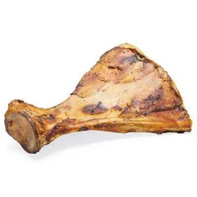 Grote, gebraden runderbot zichtbaar tegen witte achtergrond. Geen merknaam of verpakking aanwezig. Grote, gebraden runderbot zichtbaar tegen witte achtergrond. Geen merknaam of verpakking aanwezig.