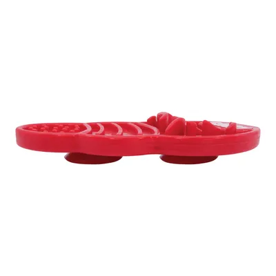 Covoraș de hrănire din plastic roșu cu ventuze și texturi diferite pentru hrănire lentă.