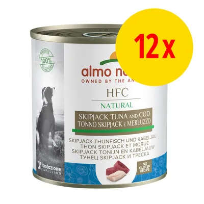 Lot de 12 boîtes Almo Nature HFC Natural thon skipjack et morue, mention sans gluten, image d’un chien sur l’emballage, texte multilingue visible.