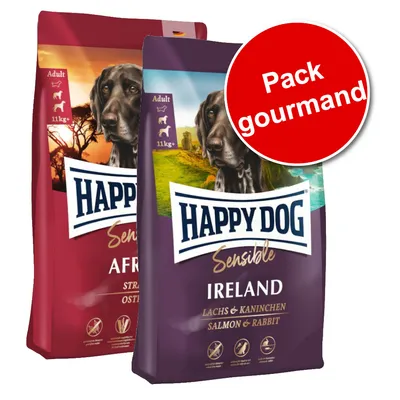 Deux sacs de croquettes Happy Dog Sensible Adult 11 kg+ : Africa Strauß et Ireland Lachs & Kaninchen. Pastille rouge avec texte « Pack gourmand » visible. Deux sacs de croquettes Happy Dog Sensible Adult 11 kg+ : Africa Strauß et Ireland Lachs & Kaninchen. Pastille rouge avec texte « Pack gourmand » visible.