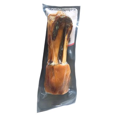 Hundben i genomskinlig plastförpackning, ingen synlig text eller varumärke på förpackningen.