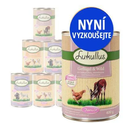 Konzervy Lukullus Geflügel & Wild Junior 400 g, nápis NYNÍ VYZKOUŠEJTE na modrém poli. Na etiketě obrázek kuřete a srnce.