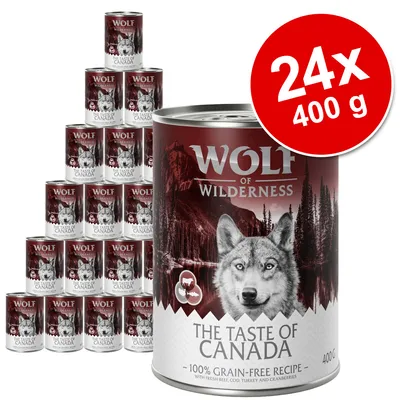 Lot de 24 boîtes Wolf of Wilderness The Taste of Canada, 400 g chacune, recette sans céréales, texte visible : 100% grain-free recipe, with fresh beef, cod, turkey and cranberries.