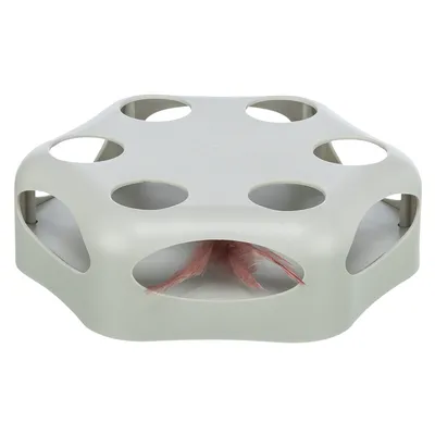 Toy for cats, grey plastic base with holes and pink feather inside.