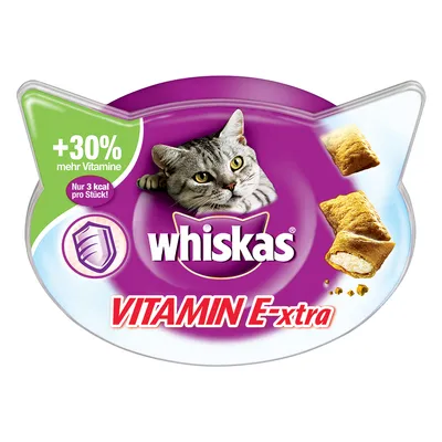 Whiskas VITAMIN E-xtra, +30 % mehr Vitamine, Nur 3 kcal pro Stück, slika mačke i punjenih grickalica za mačke. Tekst na njemačkom jeziku. Whiskas VITAMIN E-xtra, +30 % mehr Vitamine, Nur 3 kcal pro Stück, slika mačke i punjenih grickalica za mačke. Tekst na njemačkom jeziku.