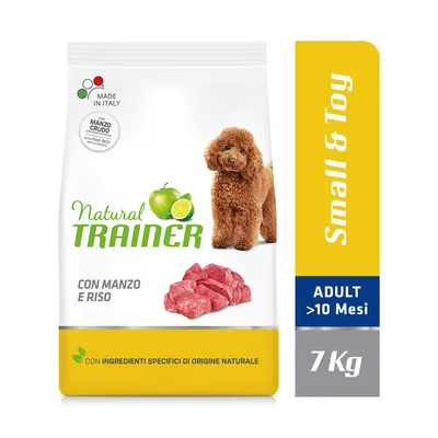 Natural Trainer hundefoder med oksekød og ris, Small & Toy, ADULT >10 Mesi, 7 kg. Made in Italy. Con ingredienti specifici di origine naturale. Billede af lille brun hund og råt oksekød.