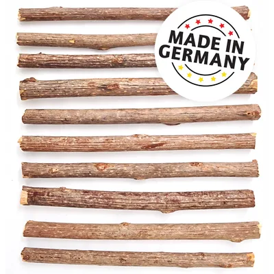 10 naturliga träpinnar, Made in Germany. Certifikat med stjärnor och texten 'Made in Germany'.