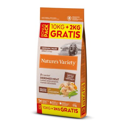 Saco de 3 kg de Nature's Variety Medium/Maxi Adult (+10 kg), carne deshuesada como primer ingrediente, con cereales saludables y pollo. Texto en inglés y español visible en el envase.