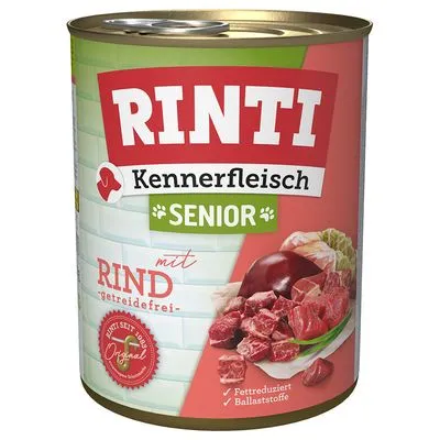 RINTI Kennerfleisch Senior met rund, getreidefrei. Tekst op blik: vetgereduceerd, ballaststoffen, sinds 1987 original. Afbeelding van vleesstukken op het etiket.
