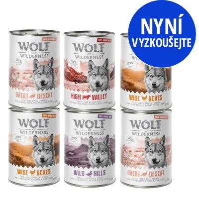 Konzervy Wolf of Wilderness: Great Desert, High Valley, Wide Acres, Wild Hills. Modrý kruh s textem NYNÍ VYZKOUŠEJTE.
