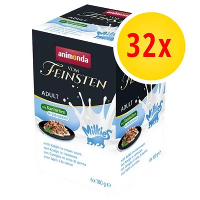 Animonda Vom Feinsten Adult Milkies, confezione da 32x100g, visibile scritta 'mit Kaninchen in Sahnesauce', immagine di cibo in salsa per gatti su piatto nero.