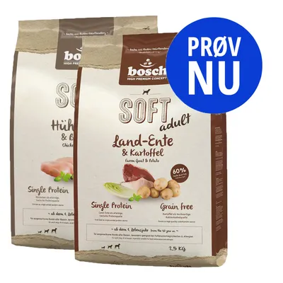 bosch SOFT adult Land-Ente & Kartoffel 2,5 kg og Hühnchen & Banane hundefoder. Single Protein, Grain Free. Blå cirkel med teksten PRØV NU. bosch SOFT adult Land-Ente & Kartoffel 2,5 kg og Hühnchen & Banane hundefoder. Single Protein, Grain Free. Blå cirkel med teksten PRØV NU.