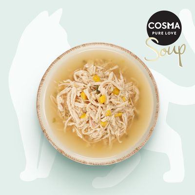 Cosma Pure Love Soup. Abgebildet ist eine Schale mit Suppe, bestehend aus zerkleinertem Fleisch und gelben Gemüsestücken.