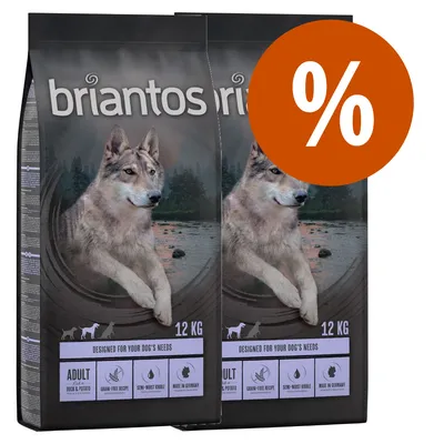 briantos ADULT Duck & Potato, 12 kg, grain-free recipe, semi-moist kibble, Made in Germany. To poser med stor procenttegn i orange cirkel øverst til højre.