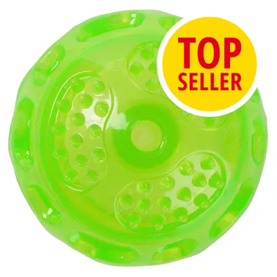 Zelený plastový míček s nápisem TOP SELLER na žlutém poli v pravém horním rohu