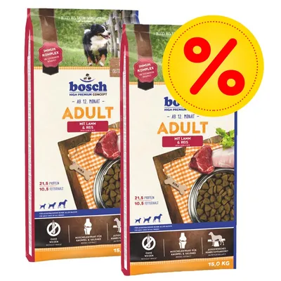 2 sacchi Bosch Adult mit Lamm & Reis 15 kg, crocchette per cani adulti, 21,5% proteine, 10,5% grassi, senza frumento, offerta con simbolo percentuale visibile sull'immagine.