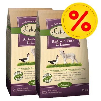 Två påsar Lukullus Barbary Duck & Lamb hundfoder, 15 kg, med bild av anka och lamm samt stor gul rabatt-symbol med röd procenttecken.