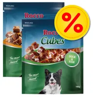 Sachets Rocco Cubes 150 g, visible texte : Duck & Fish, The smart reward!, image de cubes et d’un chien, pastille jaune avec symbole pourcentage rouge.
