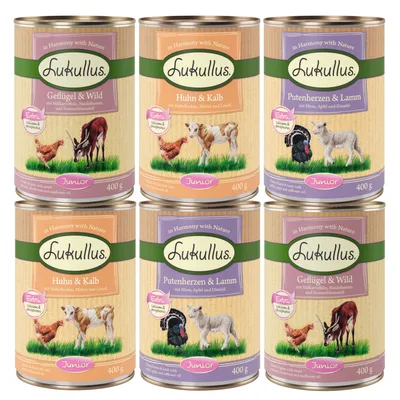 Lukullus Junior natvoer, varianten: gevogelte & wild, kip & kalf, kalkoenhart & lam. Met zoete aardappel, bosbessen, zonnebloemolie, gierst, appel en distelolie. 400g blikken.