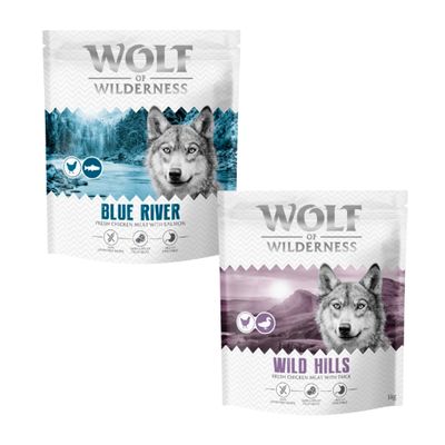 Wolf of Wilderness kutyatáp csomagok: Blue, Sunny, Wild, Green Fields. 100% grain-free recipe. Próbálja ki! felirat narancssárga körben.