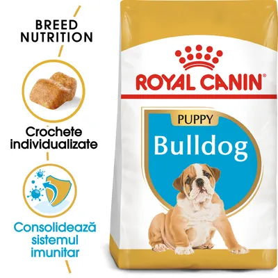 ROYAL CANIN Puppy Bulldog, imagine cu pui de bulldog pe ambalaj. Text: Crochete individualizate, Consolidează sistemul imunitar, BREED NUTRITION.