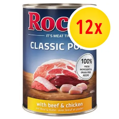Confezione da 12 lattine Rock Classic Pure, 400 g, con carne di manzo e pollo. Testo visibile: 100% fresh ingredients & grain-free recipe, with beef & chicken.
