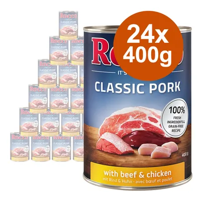 Rocco Classic Pork with beef & chicken, 24 x 400 g säilykepakkaus. Teksti: 100 % fresh ingredients & grain-free recipe. Kuvassa lihaa ja purkkien pino. Rocco Classic Pork with beef & chicken, 24 x 400 g säilykepakkaus. Teksti: 100 % fresh ingredients & grain-free recipe. Kuvassa lihaa ja purkkien pino.