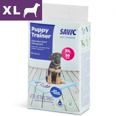 Savic Puppy Trainer super absorbent training pads, XL 30 pcs, 90 x 60 cm. Billede af hvalp på træningsmåtte. Tekst: with attractant, new improved version, dry! 30 dage.