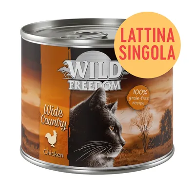 Lattina singola Wild Freedom Wide Country Chicken, 100% grain-free recipe, immagine di gatto e paesaggio al tramonto sulla confezione.