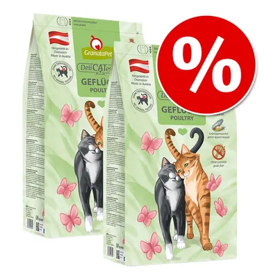 GranataPet DeliCATessen gevogelte, geproduceerd in Oostenrijk, zonder dierproeven, graanvrij, met groenlipmossel. Twee katten en roze vlinders op verpakking. Kortingssymbool zichtbaar.