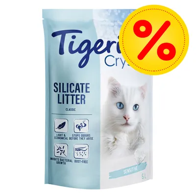 Sac de litière silicate Tigerino Crystals Sensitive 5L, texte en anglais : light & economical, stops odours before they arise, inhibits bacterial growth, dust-free, image de chat blanc.