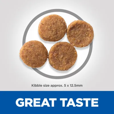 Four round kibbles shown with text stating kibble size approximately 5 by 12.5 millimetres and the phrase great taste.