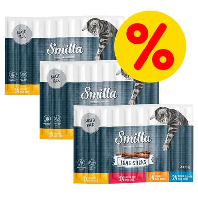 Smilla Mixed Pack Long Sticks, 10×5 g. Tekst: 3× chicken with duck, 3× rich in beef with liver, 2× turkey with rabbit, 2× rich in salmon with trout. Stor gul procenttegn.