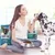 Happy Dog Karibik Trockenfutter in Schüssel, Dalmatiner wird gefüttert. Verpackung im Hintergrund zeigt Produkt Happy Dog Sensible Medium Adult.
